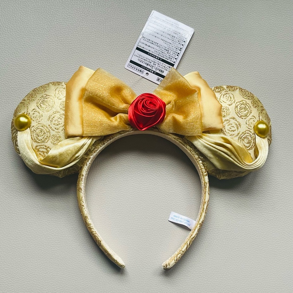 Tokyo Disney 💫 Ears Gold w Red rose, themed for Belle bedazzled in shiny gold.